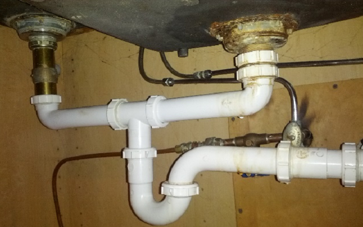 replacing drain pipes under kitchen sink